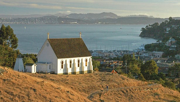 White church overlooking the Bay